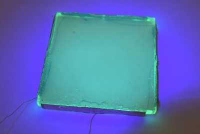 A model luminescent solar concentrator. A model luminescent solar concentrator.