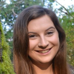 A young woman with smiles for the camera.